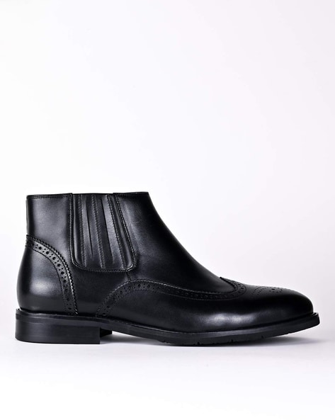 Heeled hot sale brogue boots