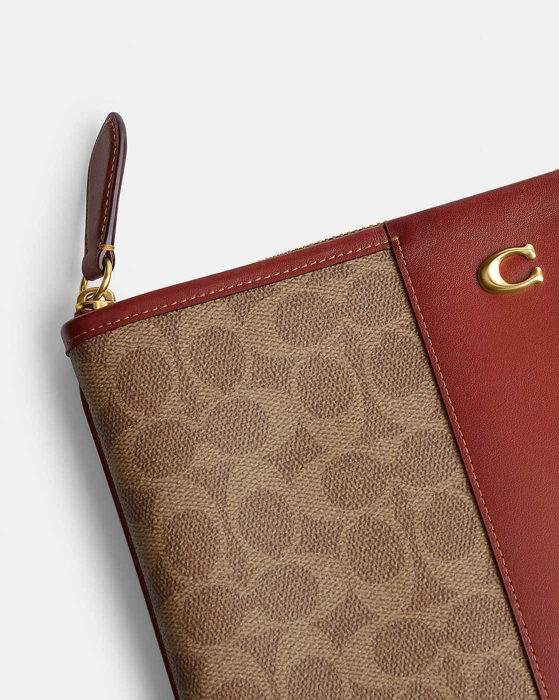 Buy Coach Zip Top Closure Pouch 28 in Signature Canvas | Beige