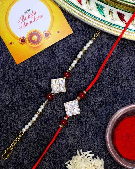 Karatcart Set of 2 Bhaiya Bhabhi Rakhis with Roli Chawal