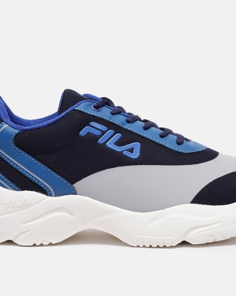 White and store blue fila shoes