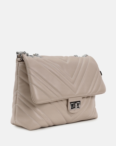 Kazo Handbags : Buy Kazo off White Solid Handbag Online | Nykaa Fashion.