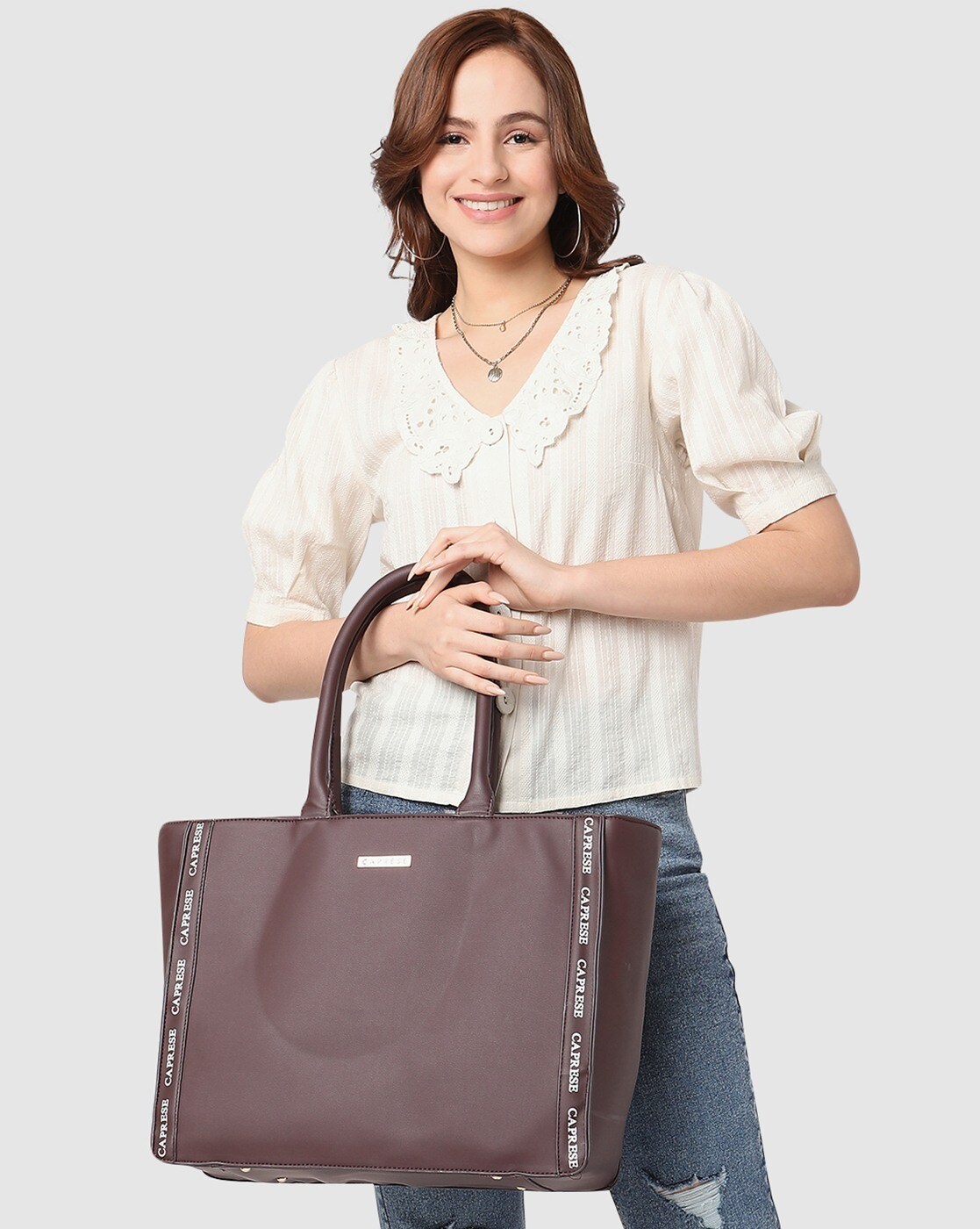 Buy Caprese Womens Zipper Closure Shoulder Handbag (Black_Free Size) at  Amazon.in