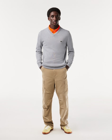 Grey sweater and khaki store pants