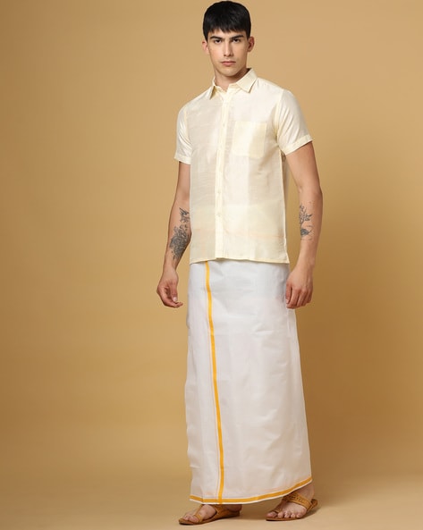 white shirt and mundu