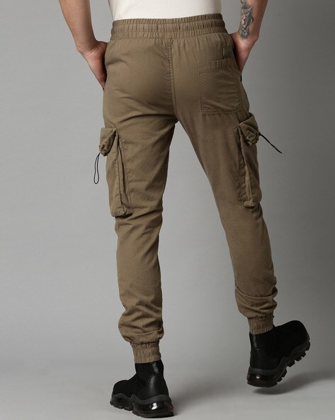 Buy Olive Trousers & Pants for Men by BREAKBOUNCE Online