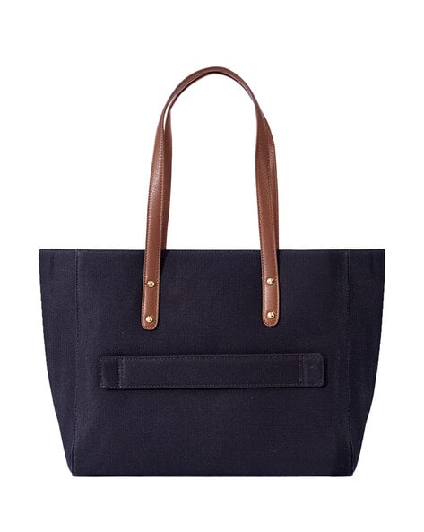 Handbag with side online pockets