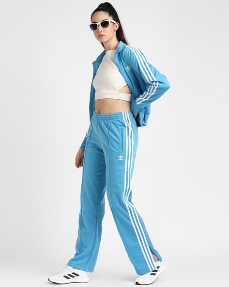 Light blue adidas jacket with hot sale white stripes