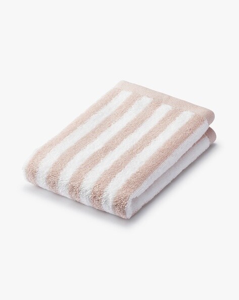 https://assets.ajio.com/medias/sys_master/root/20230818/19eW/64df6952ddf77915195174e5/muji-smoky-pink-hand-%26-face-towels-pile-hand-towel-with-loop.jpg