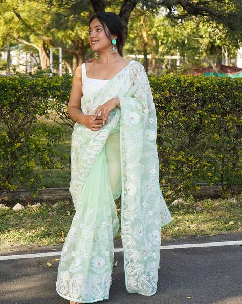 Bhavana's White with Green Silksaree | Netted blouse designs, Full sleeve  blouse, Kerala saree blouse designs