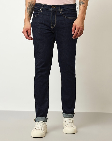 Wrangler Navy Blue Solid Mid Rise Slim Fit Jeans at Rs 2699/piece