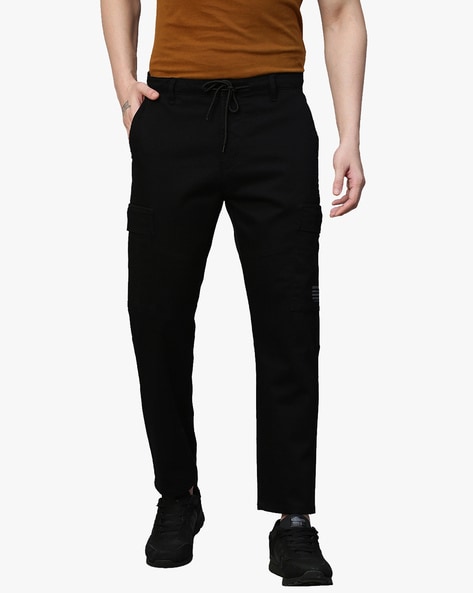 Buy Black Trousers & Pants for Men by GENIPS WITH LOGO Online