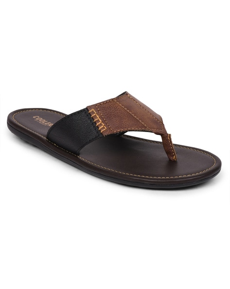 Tan flip flops with black straps new arrivals