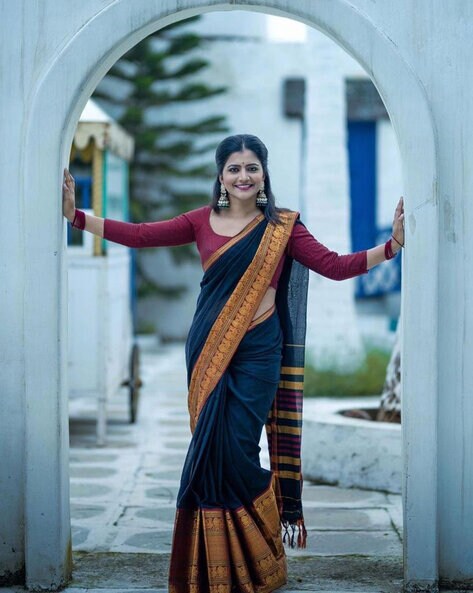 A Woman in Pink Sari Standing and Posing · Free Stock Photo