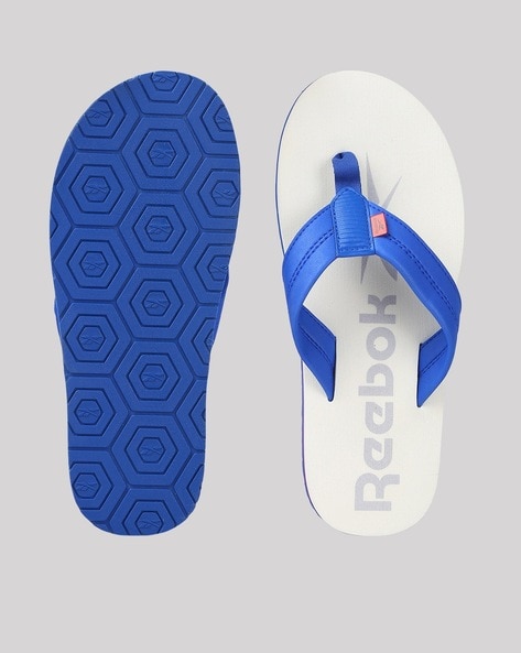 Buy White Flip Flop Slippers for Men by Reebok Online Ajio