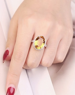 Oval shape stone ring on sale design