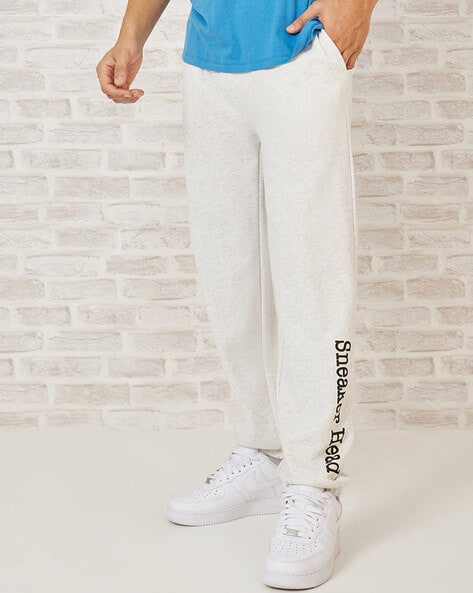 Buy Cream Track Pants for Men by Styli Online