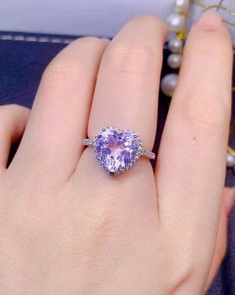 Exploration of purples – my purple moissanite ring next to my purple  sapphire engagement ring. Both beautiful in different ways! : r/Moissanite