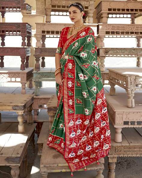 aswa - AW005 Price : INR 1800/- Pista green self print saree with elephant  print and black & red net border all over the saree Blouse : Pista Green  self print For