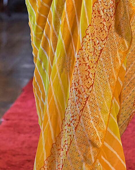 Yellow leheriya saree with unstitched blouse piece - Griva Designer -  4256129