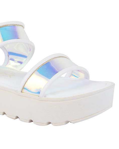 White sandals with online platform