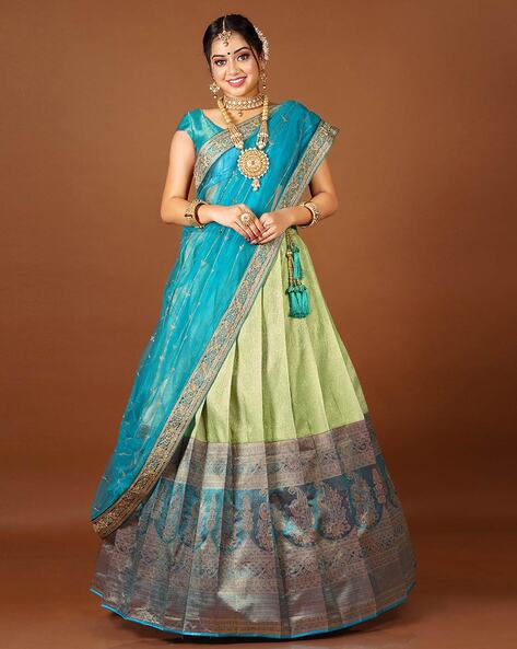 White Banaras half-saree with zari buttas, contrast blue jaal jacquard  blouse, intricately designed border & dhavani