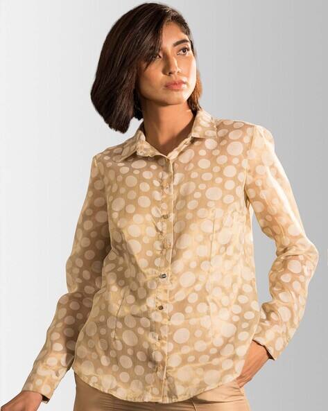 gold polka dot shirt
