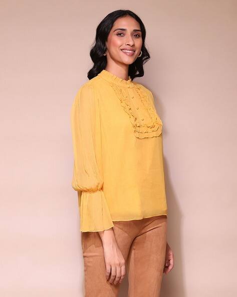 mustard ruffle blouse