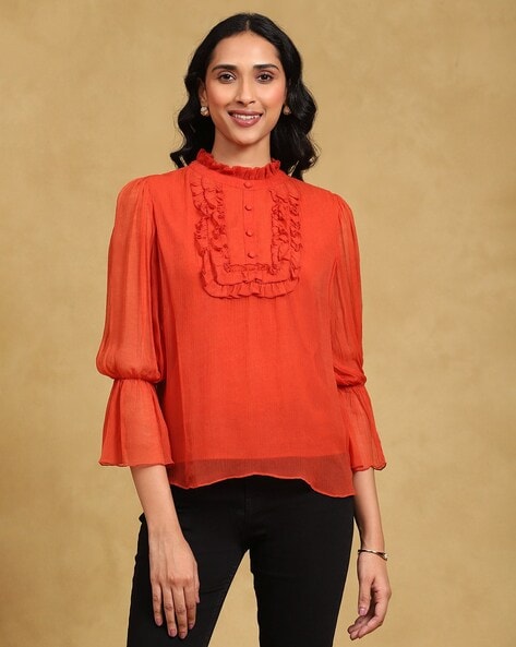 Orange ruffle hotsell sleeve top