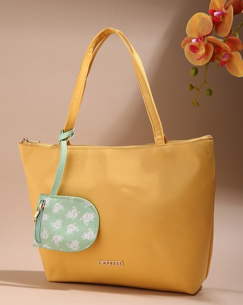 Buy Caprese Taupe Solid Handheld Bag - Handbags for Women 2468530 | Myntra