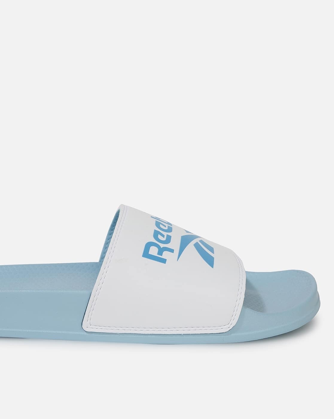 white reebok slides