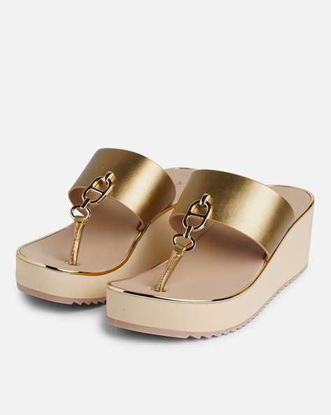 Aldo discount gold wedges