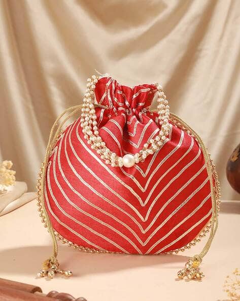 Jazz And Sizzle Embellished Wristlet with Pearl-Beaded Handle