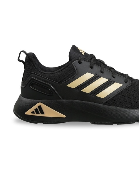 Adidas black sale gold sneakers