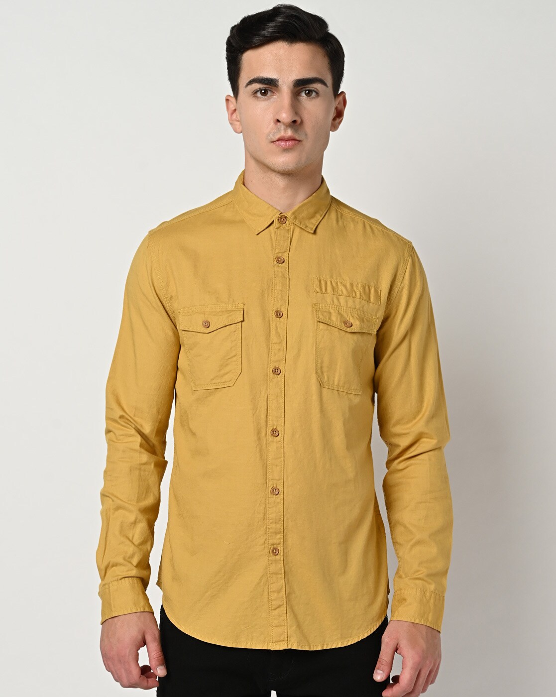 Young Indian Man Wearing Denim Shirt Standing Over Isolated Yellow  Background Cheerful With A Smile Of