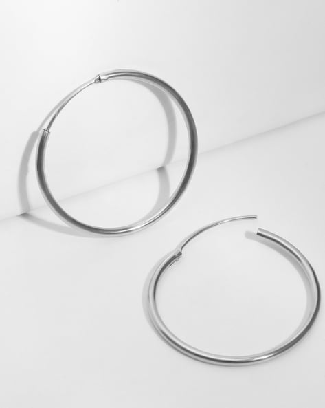 Medium 20-40mm Slim Sterling Silver Hoop Earrings - Studio Jewellery US | Silver  hoop earrings medium, Small silver hoop earrings, Sterling silver hoop  earrings