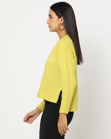 Side shoulder outlet sweater