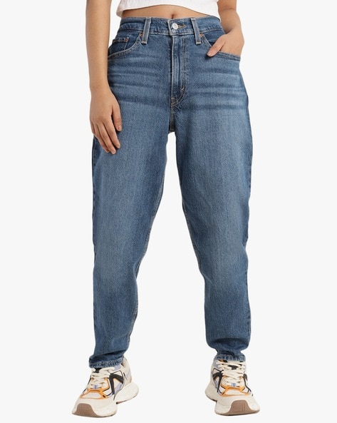 Levis High-Rise Mid-Wash Tapered Fit Jeans