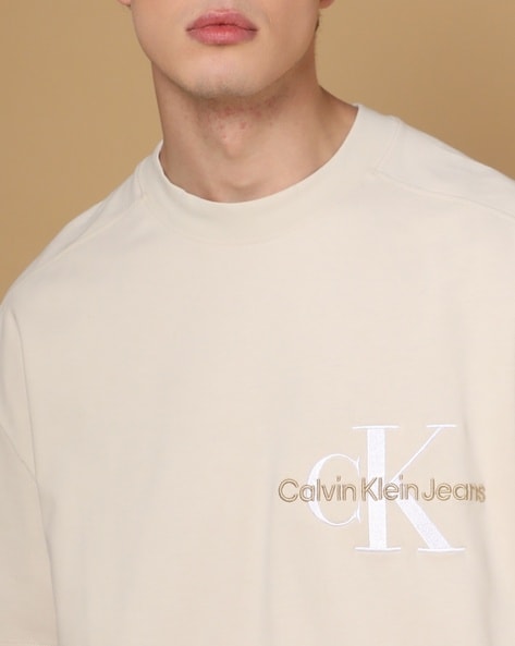 Buy Beige Tshirts for Men by Calvin Klein Jeans Online