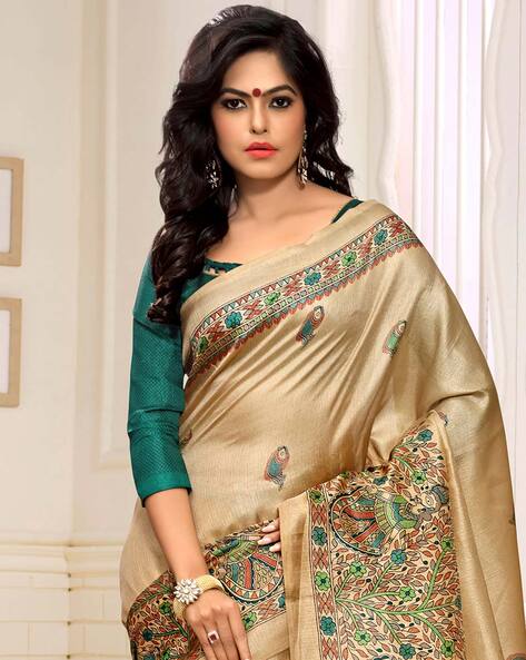 What is the best way to style a maroon blouse with a cream-colored silk  saree? - Quora