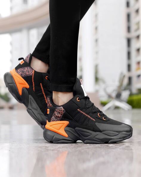 Black orange hot sale basketball shoes