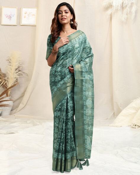 Sea green silk cotton saree with zari woven border