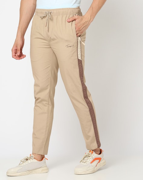 Buy Off White Track Pants for Men by Teamspirit Online | Ajio.com