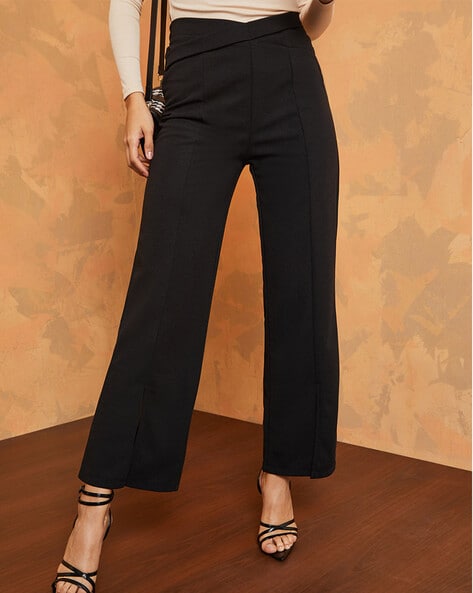 https://assets.ajio.com/medias/sys_master/root/20230920/imm8/650a8accafa4cf41f5f20280/styli-black-pants-women-cross-waist-detail-wide-leg-2-way-stretch-trousers.jpg