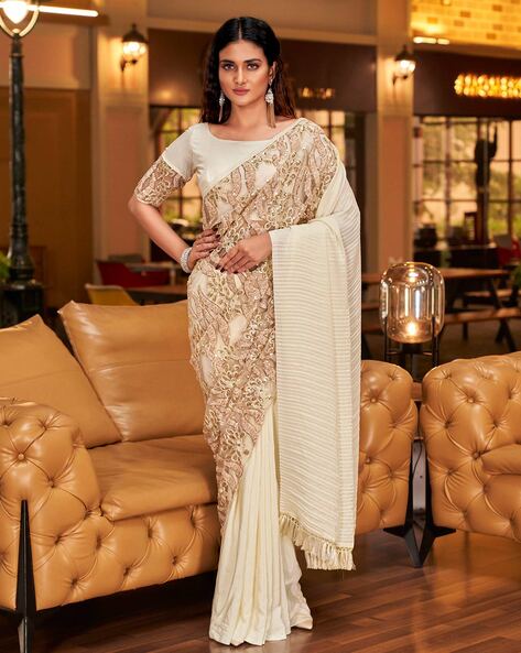 Best embroidered cream color dola silk saree with a maroon blouse