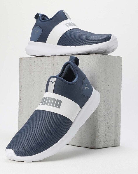 PUMA Caven Mid Leather Sneaker in Blue for Men | Lyst