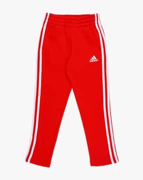 white and red adidas joggers