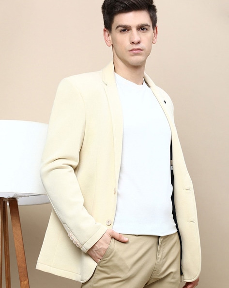 cream colored blazer