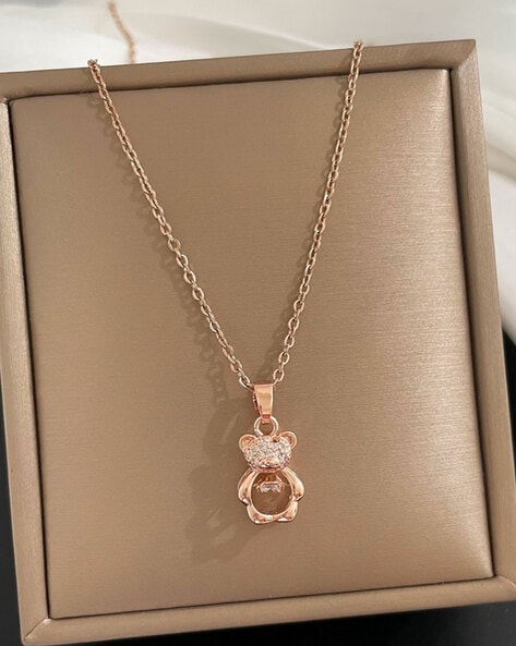 Disney Treasures Minnie Sterling Silver & 9ct Rose Gold Mother of Pearl &  0.10ct Diamond Pendant | H.Samuel