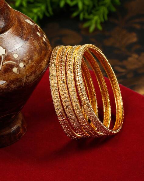 Four bangles deals set in gold