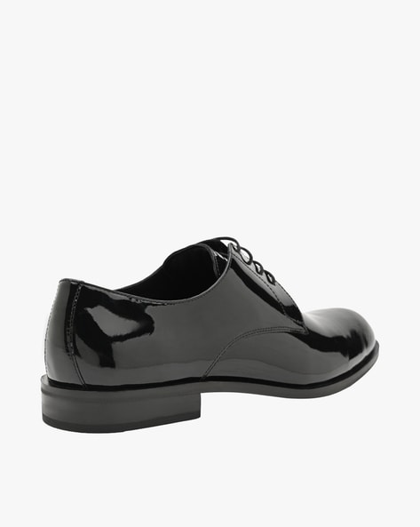 Tie up black on sale shoes